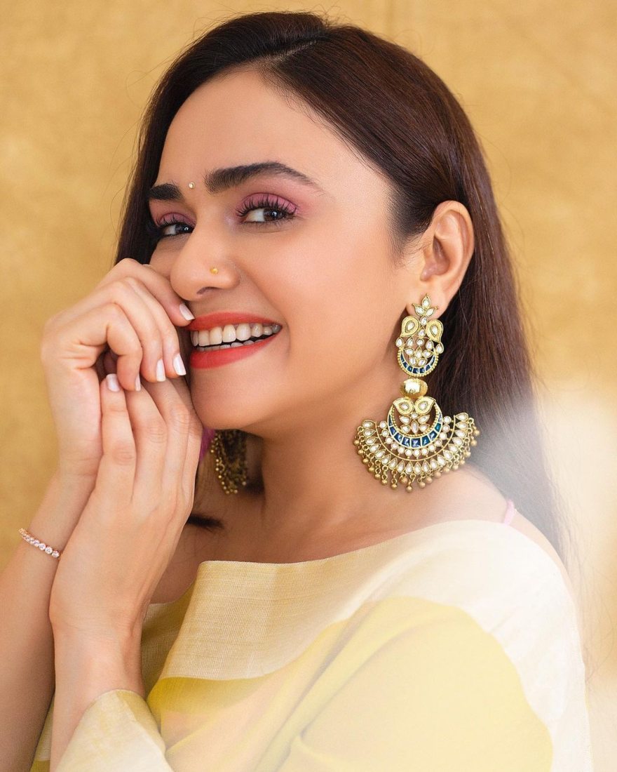 Amruta Khanvilkar in a lime yellow mint and oranges saree for an ott launch Amruta Khanvilkar in a lime yellow mint and oranges saree for an ott launch