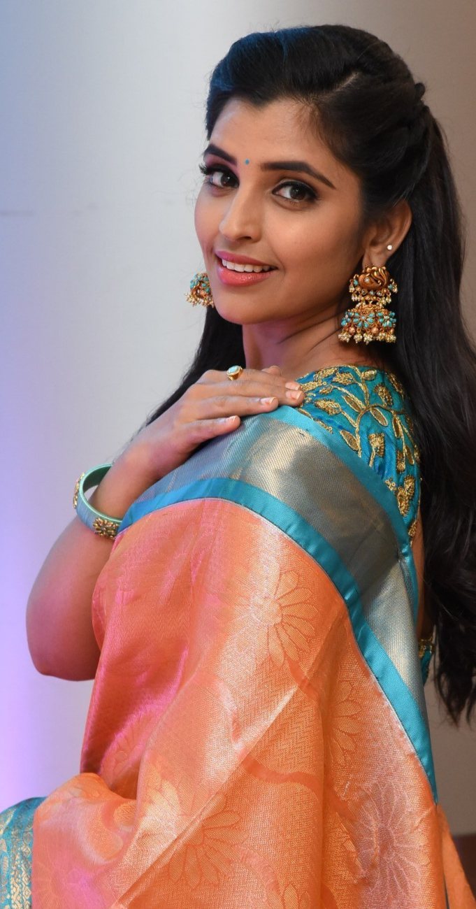 Syamala in a salmon pink pattu saree for style collections by Padma 2 Syamala in a salmon pink pattu saree for style collections by Padma-2