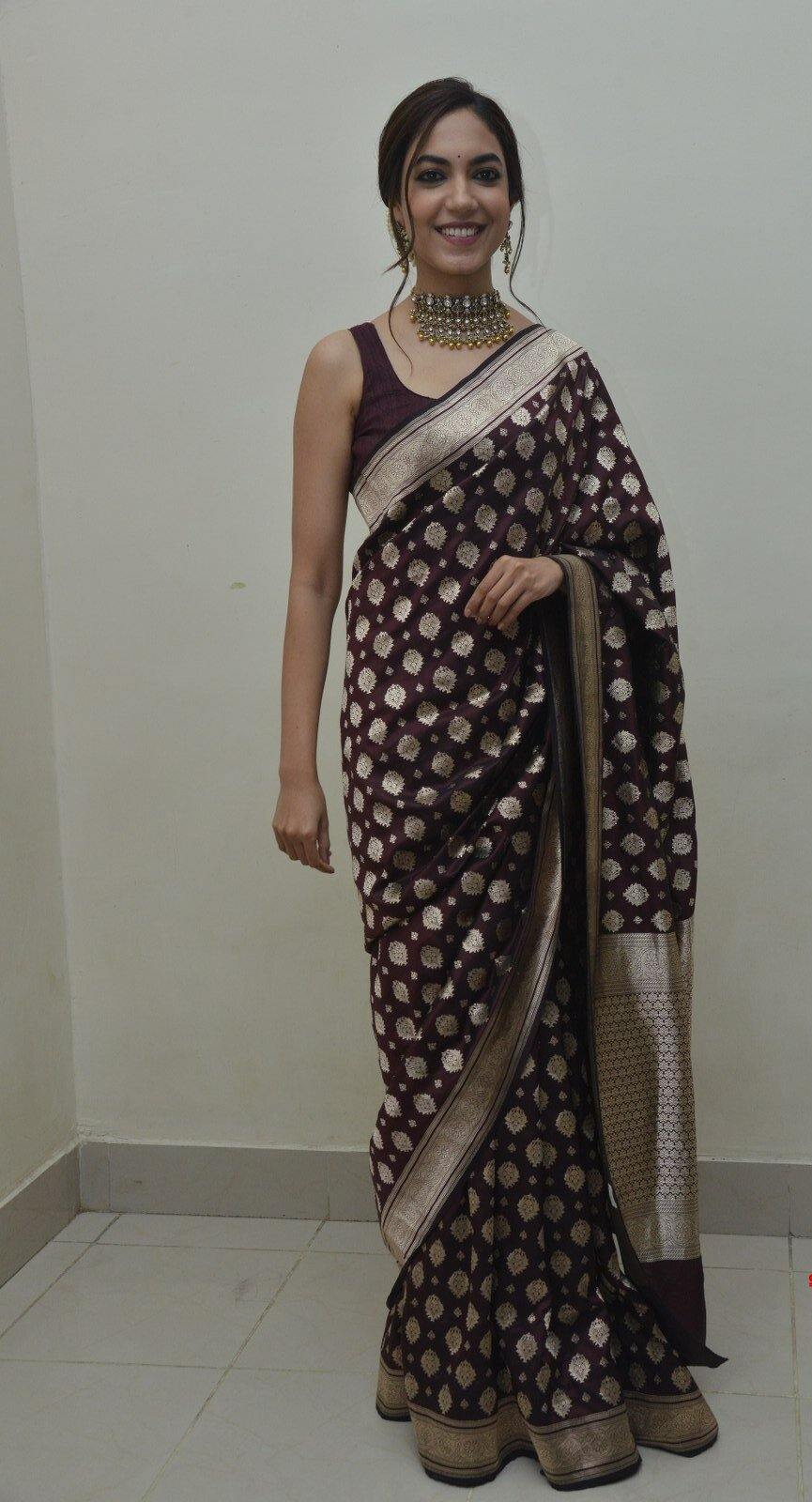 Ritu Varma in a wine saree by Raw mango for varudu kaavelenu pre release event 1 Ritu Varma in a wine saree by Raw mango for varudu kaavelenu pre-release event-1