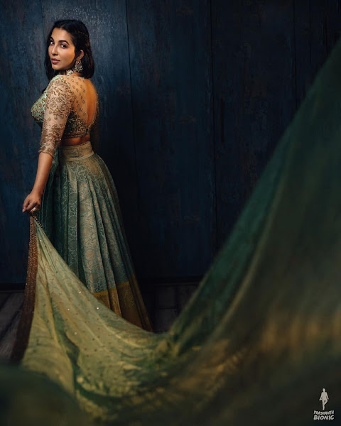 Parvati Nair Allurin Poses in Shiny Dress Flipkart