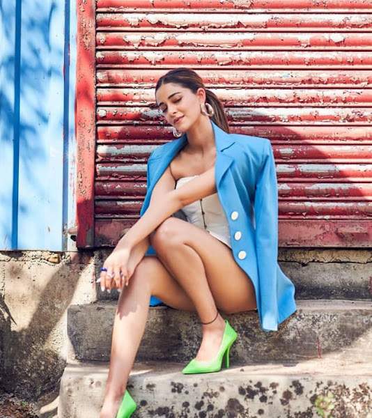 During Gehraiyaan promotions Ananya Panday wears a blue jacket with a white short skirt Flipkart
