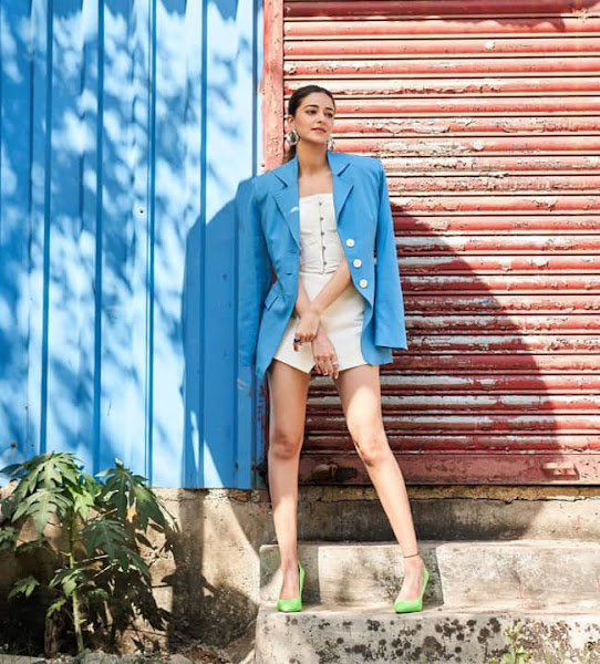 During Gehraiyaan promotions Ananya Panday wears a blue jacket with a white short skirt Flipkart