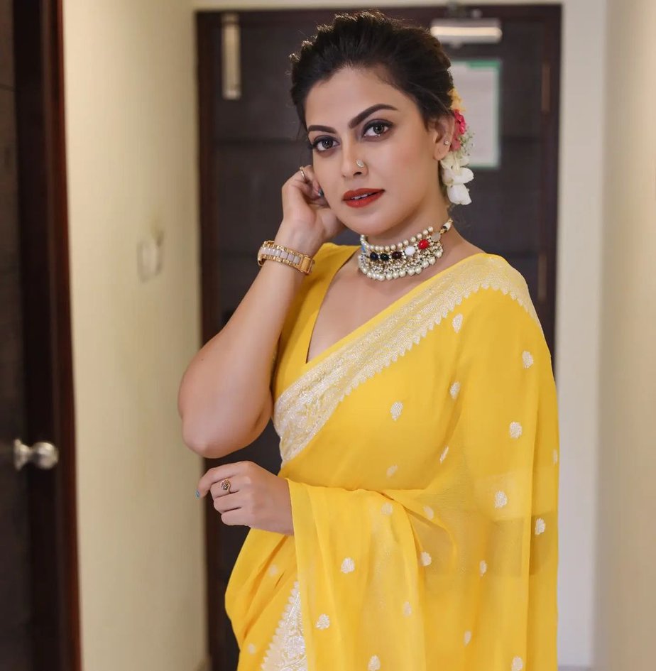 anusree nair in a yellow saree by iha designs anusree nair in a yellow saree by iha designs