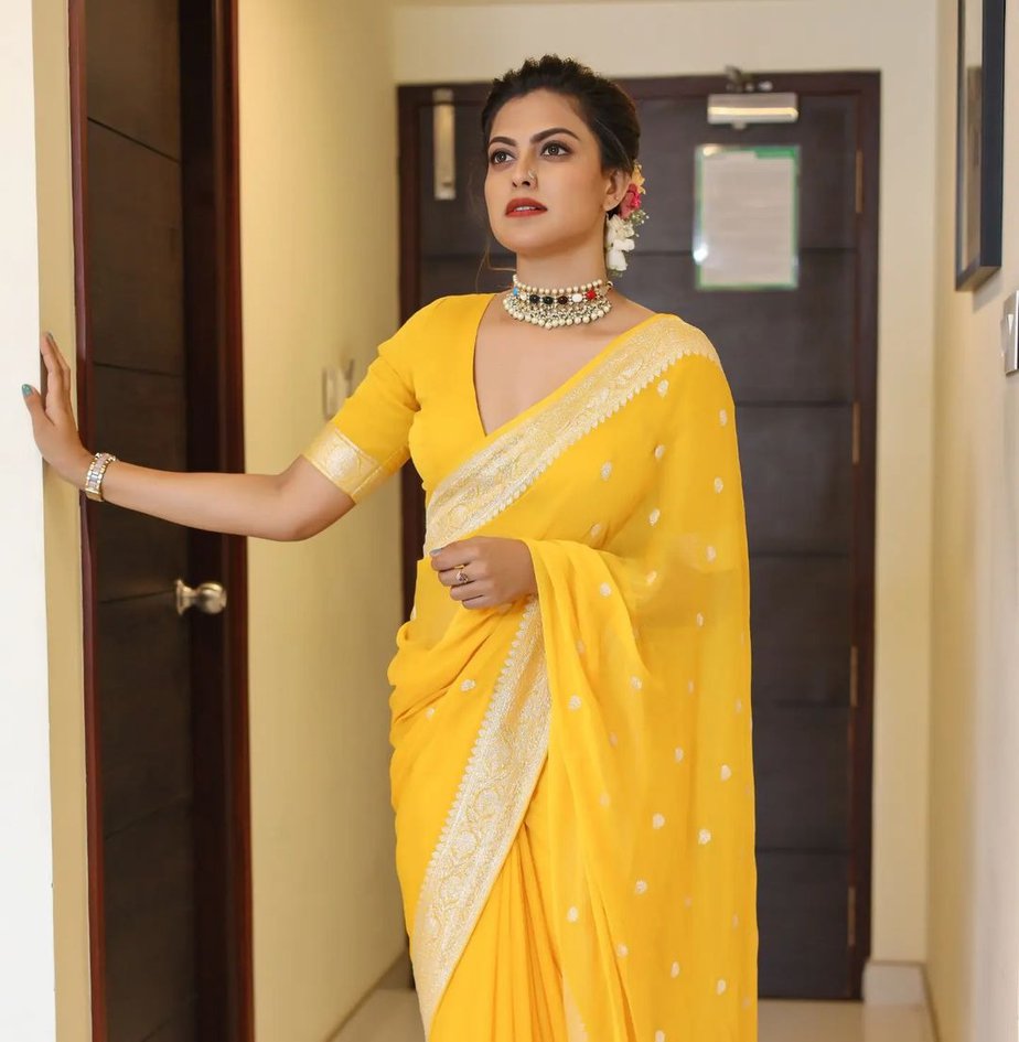 anusree nair in a yellow saree by iha designs1 anusree nair in a yellow saree by iha designs1