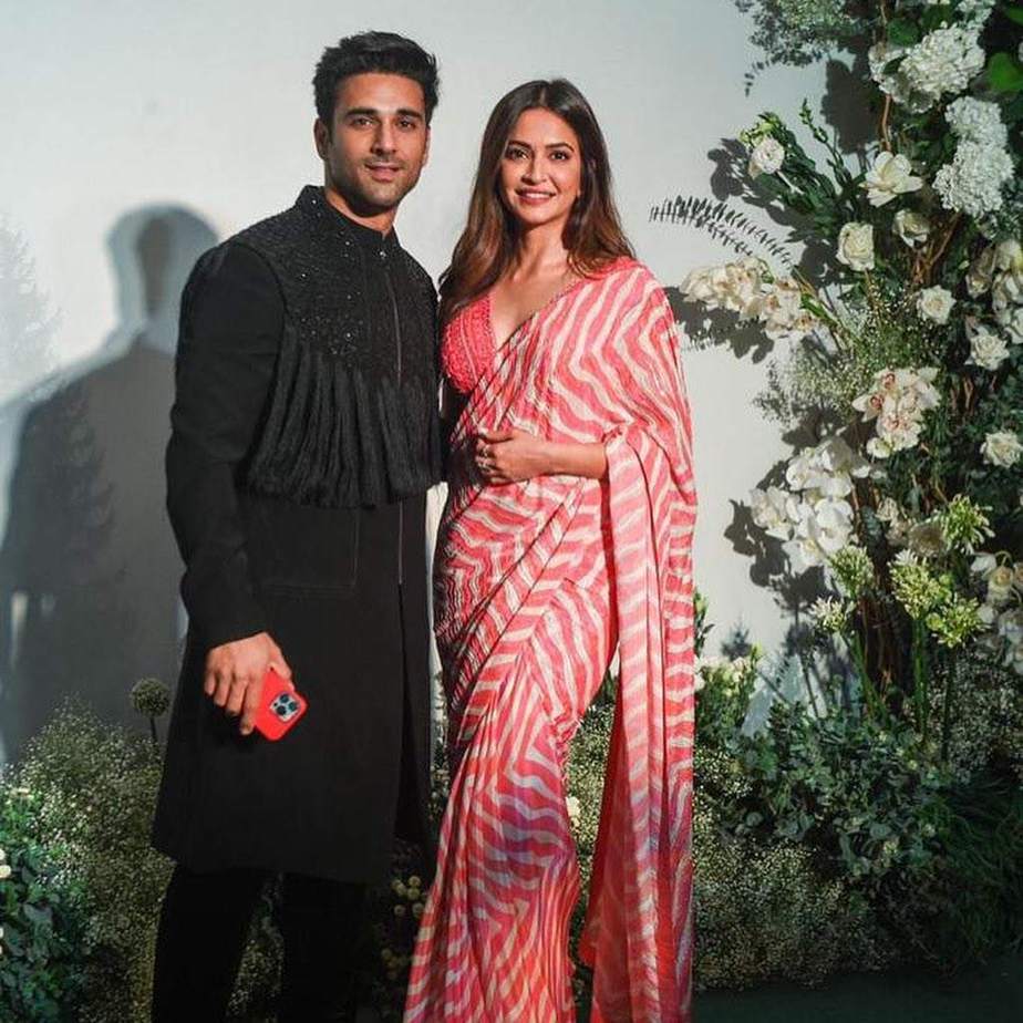 Kriti Kharbanda celebrates Eid at an Iftar party in a pink saree! How to style a saree