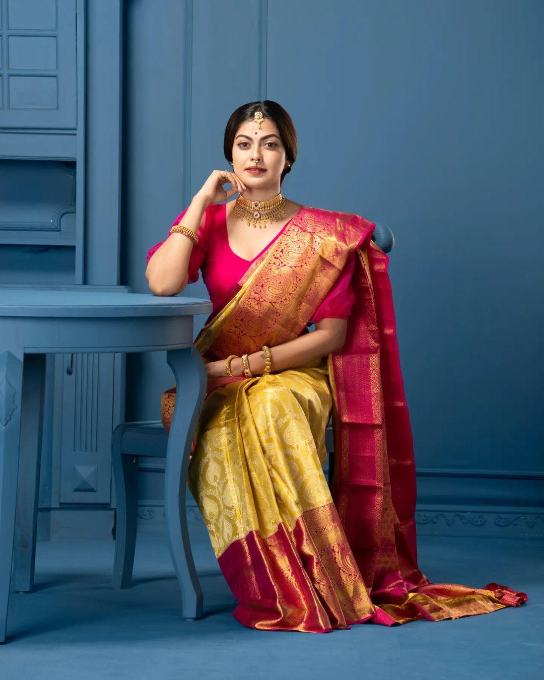 anusree nair in a yellow saree by kanchivaram anusree nair in a yellow saree by kanchivaram