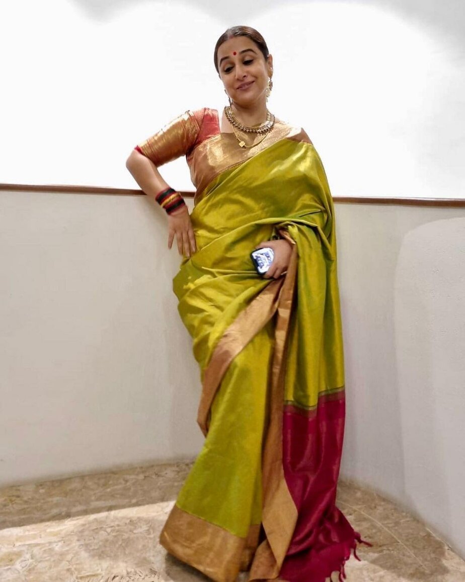 vidya balan in a green saree for diwali puja Vidya Balan’s ethnic look in a lime green silk saree for Diwali puja! Celebrity Sarees