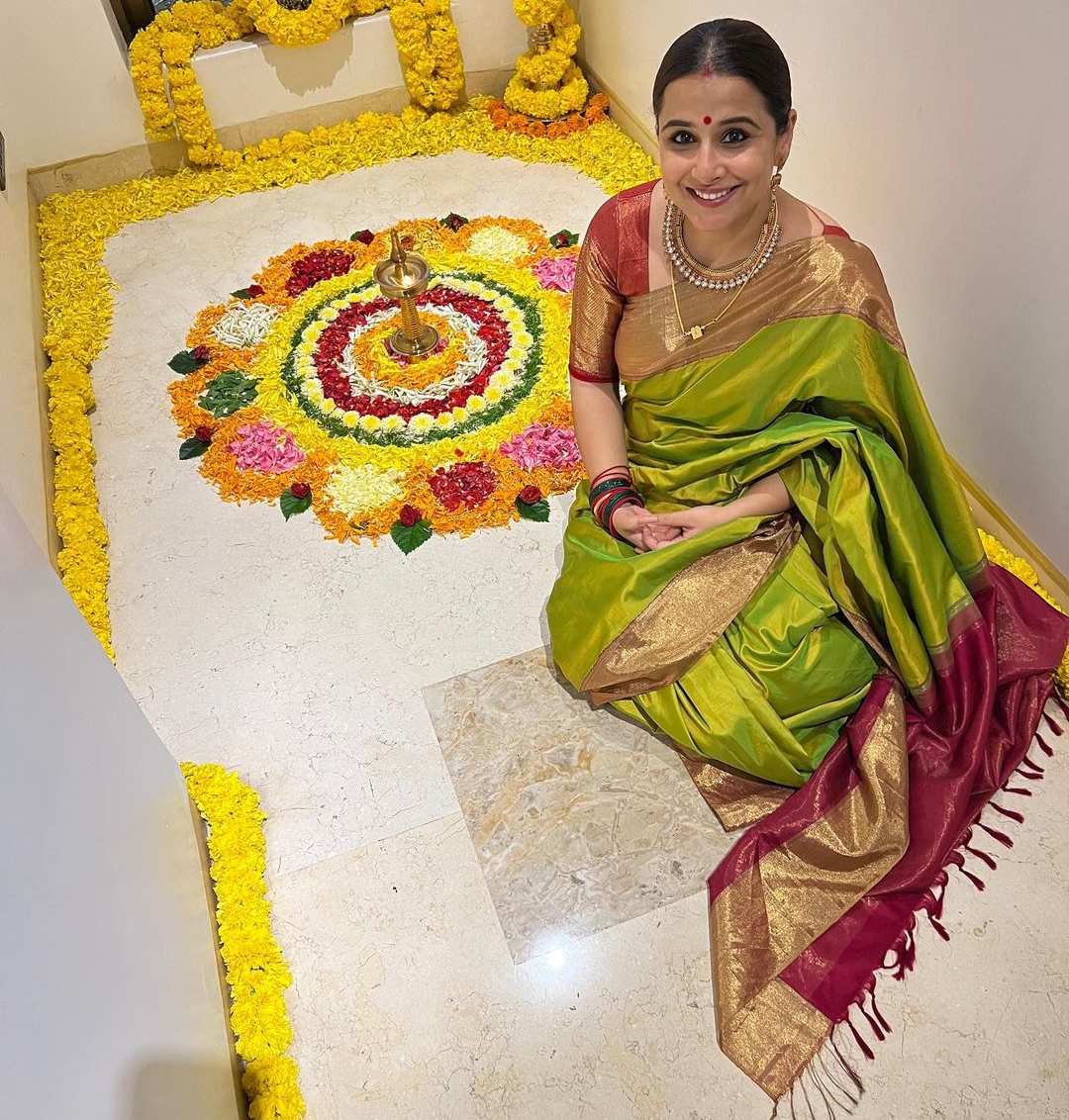 vidya balan in a lime green saree for diwali puja00.1 Vidya Balan’s ethnic look in a lime green silk saree for Diwali puja! Celebrity Sarees