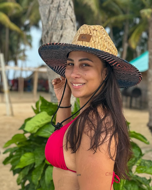 Nicole Faria looking stunning in a bold bikini pose.