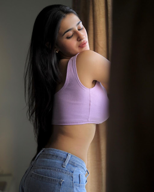 Prakriti Pavani’s trendy look in a sleeveless purple top