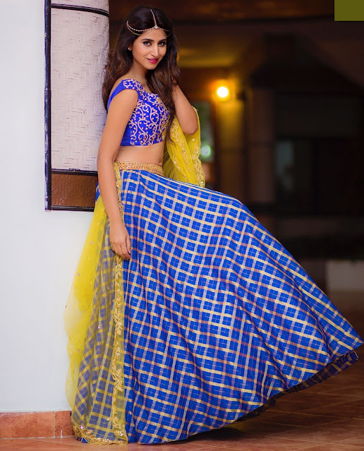 Varshini Sounderajan in a stunning traditional lehenga.