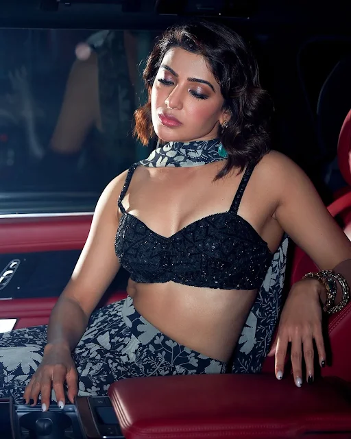 Samantha in sleeveless top and floral skirt, stylish look