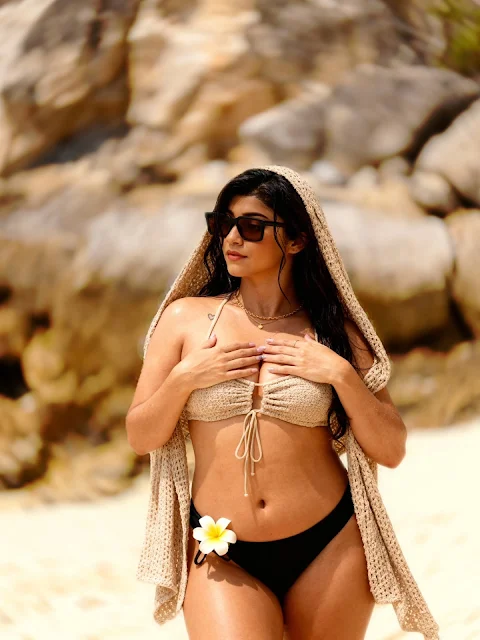 Sukrita Sharma hot pics in crochet bikini with hooded scarf