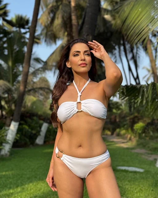Navina Bole latest stills in white bikini