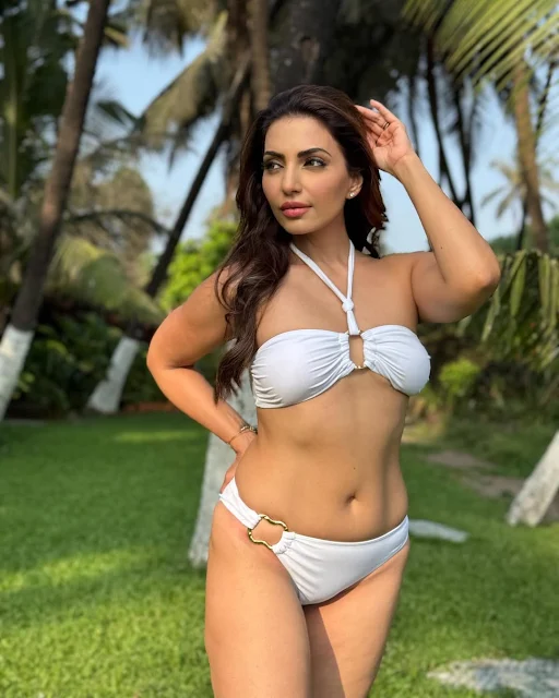 Navina Bole latest stills in white bikini