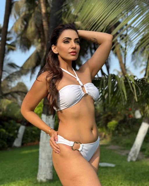 Navina Bole latest stills in white bikini