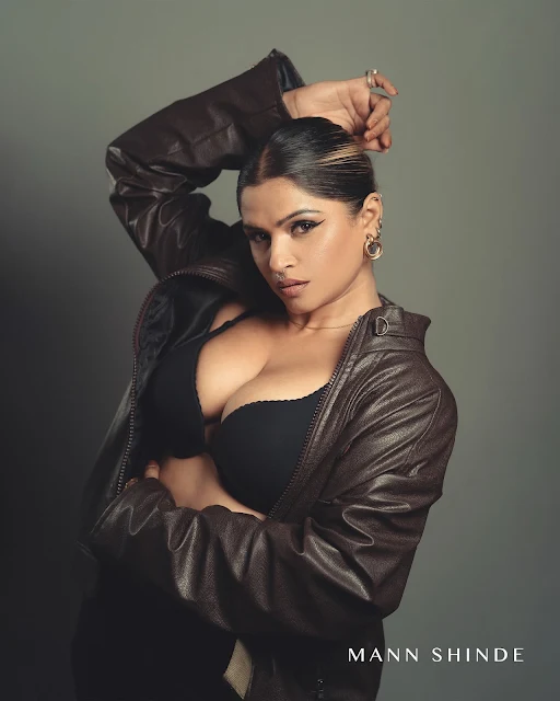 Bhavana Karekar in black top and dark trousers
