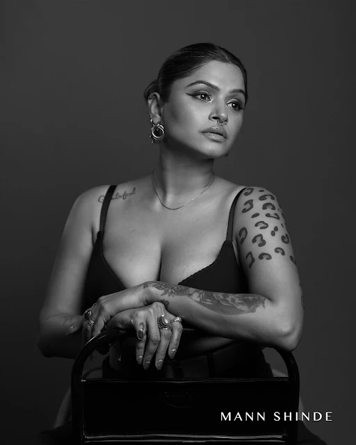 Bhavana Karekar in black top and dark trousers