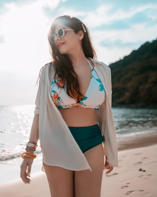 Shruti Goel in floral beachwear and cream cover-up