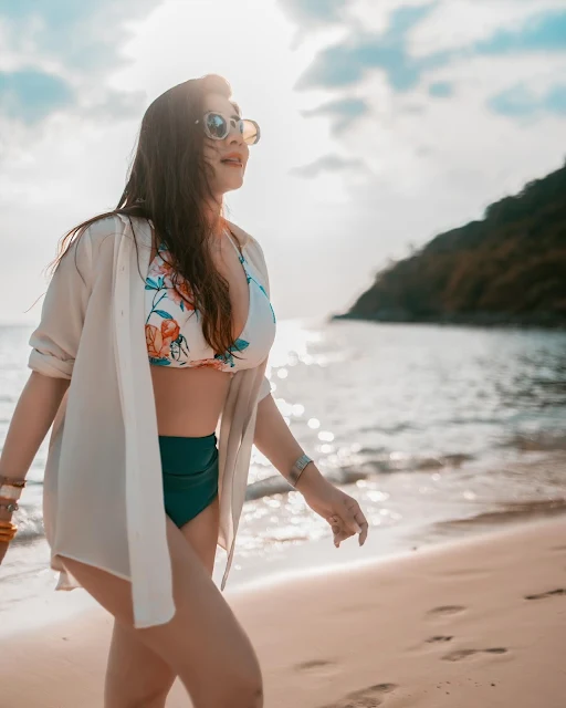 Shruti Goel in floral beachwear and cream cover-up