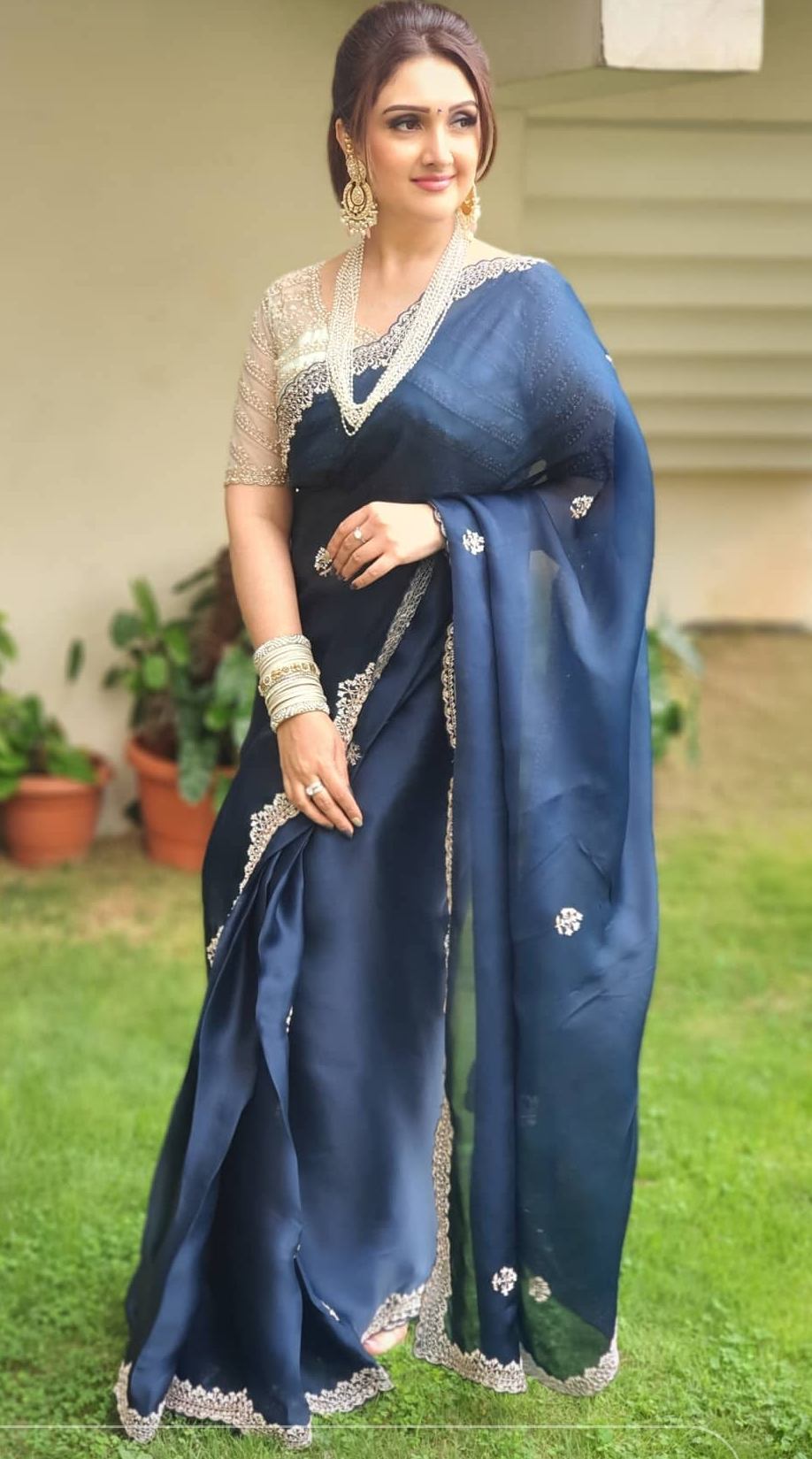 Sridevi Vijaykumar is a sight to behold in a navy blue organza saree! Sridevi