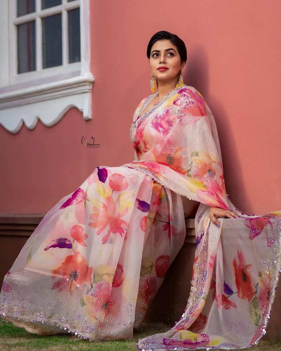 Poorna proves how on point her style game is with a peach organza saree! Sarees