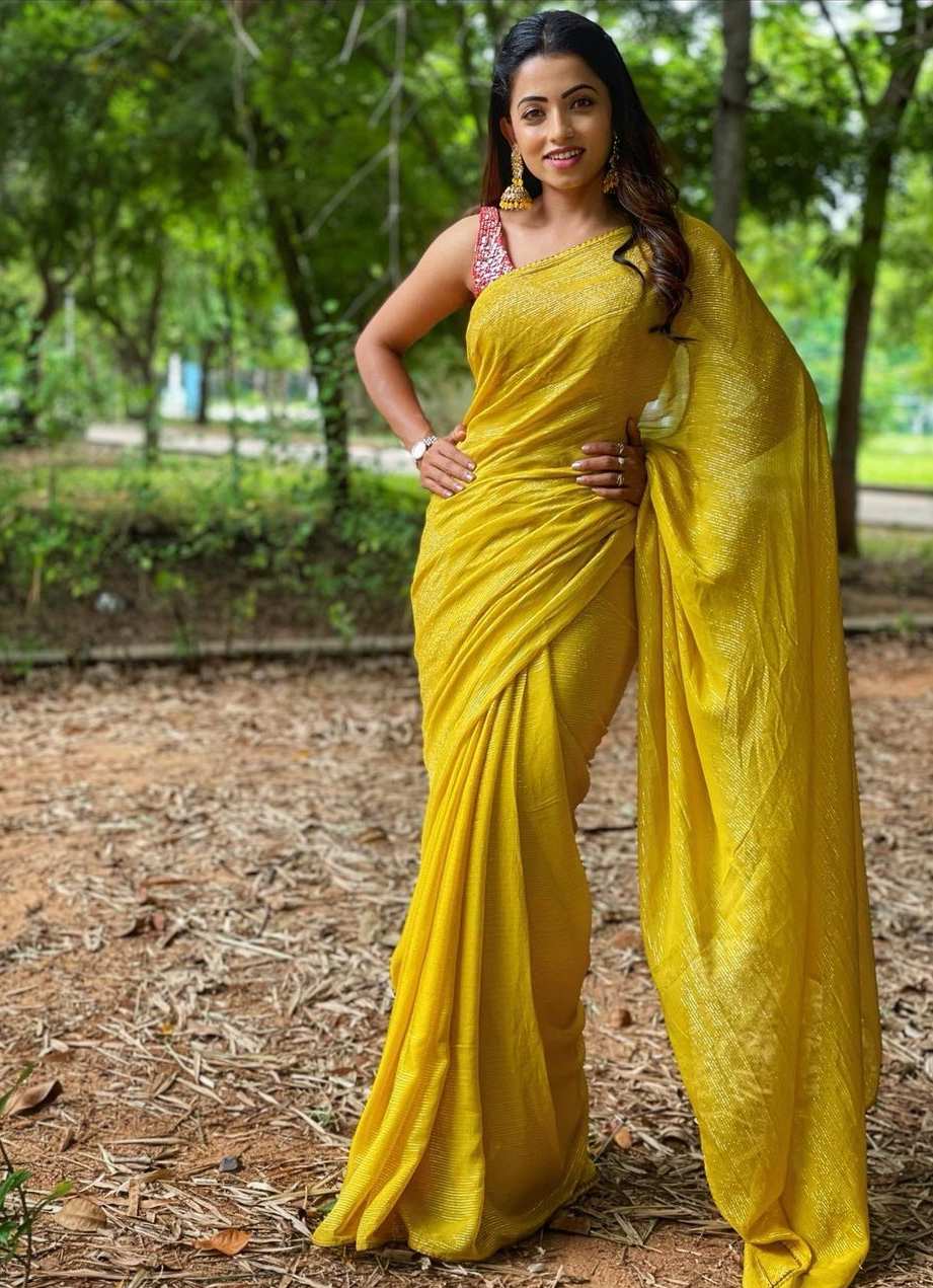 Navya Swamy nails yet one more look in a brilliant yellow saree! How to style a saree for an evening party
