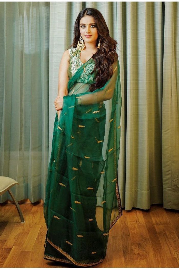 Nidhhi Agerwal aces ethnic look in a green organza saree! Nidhhi Agerwal aces ethnic look in a green organza saree! Raw Mango