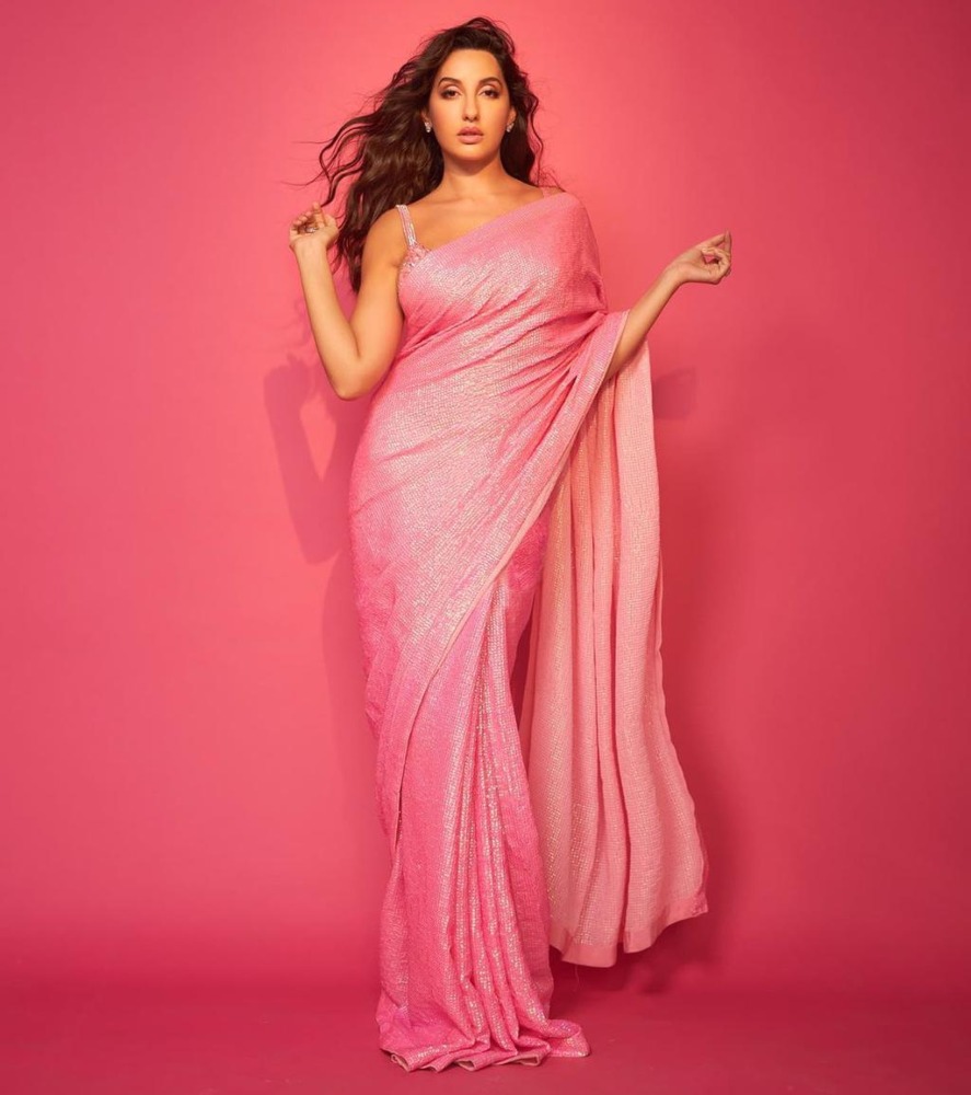 Nora Fatehi will make your heart skip a beat in her sizzling pink saree! Nora Fatehi will make your heart skip a beat in her sizzling pink saree! Sarees