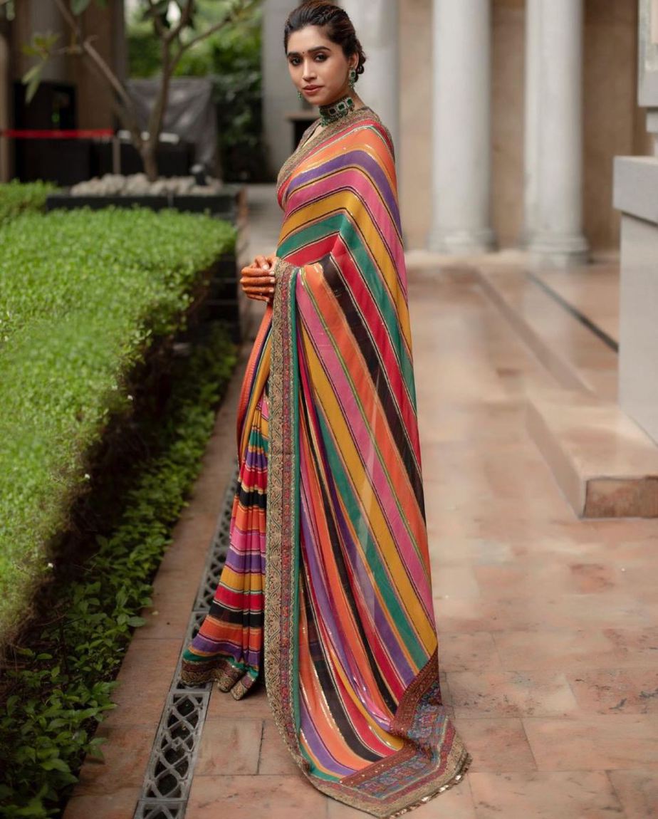 Aarti Ravi appears vibrant in a multi-coloured striped saree! Celebrity Sarees