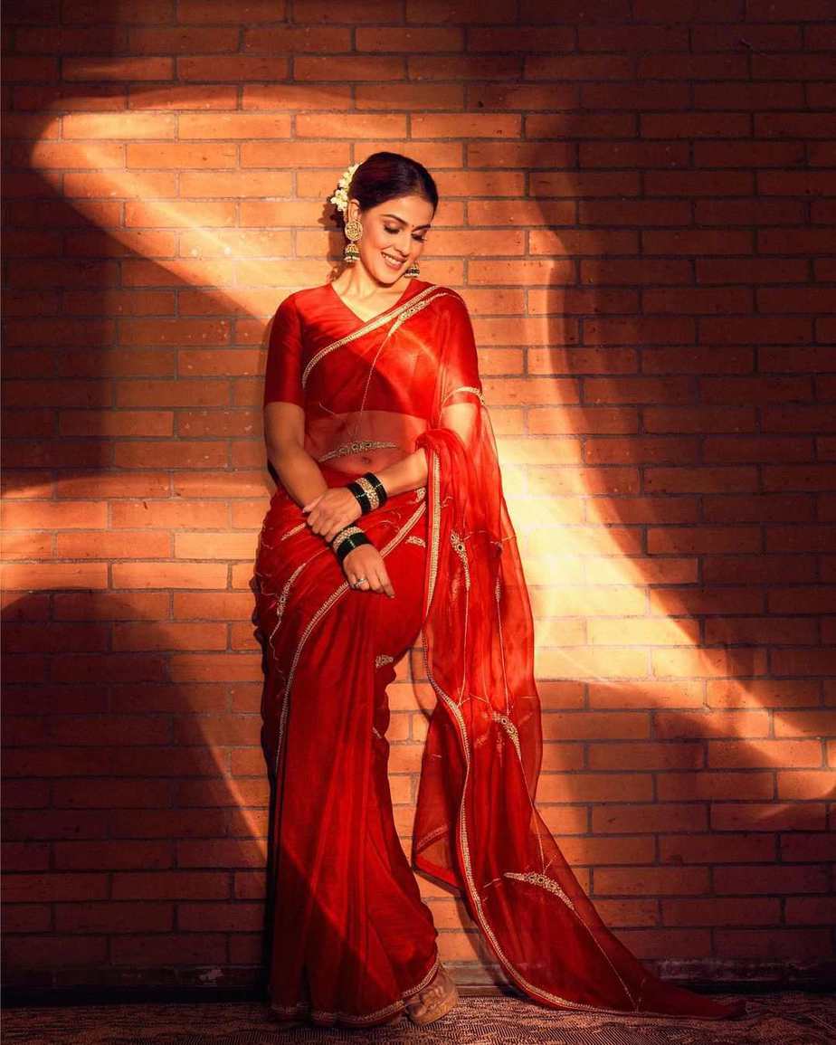 Genelia Deshmukh appears radiant in a bright red Organza saree! Genelia