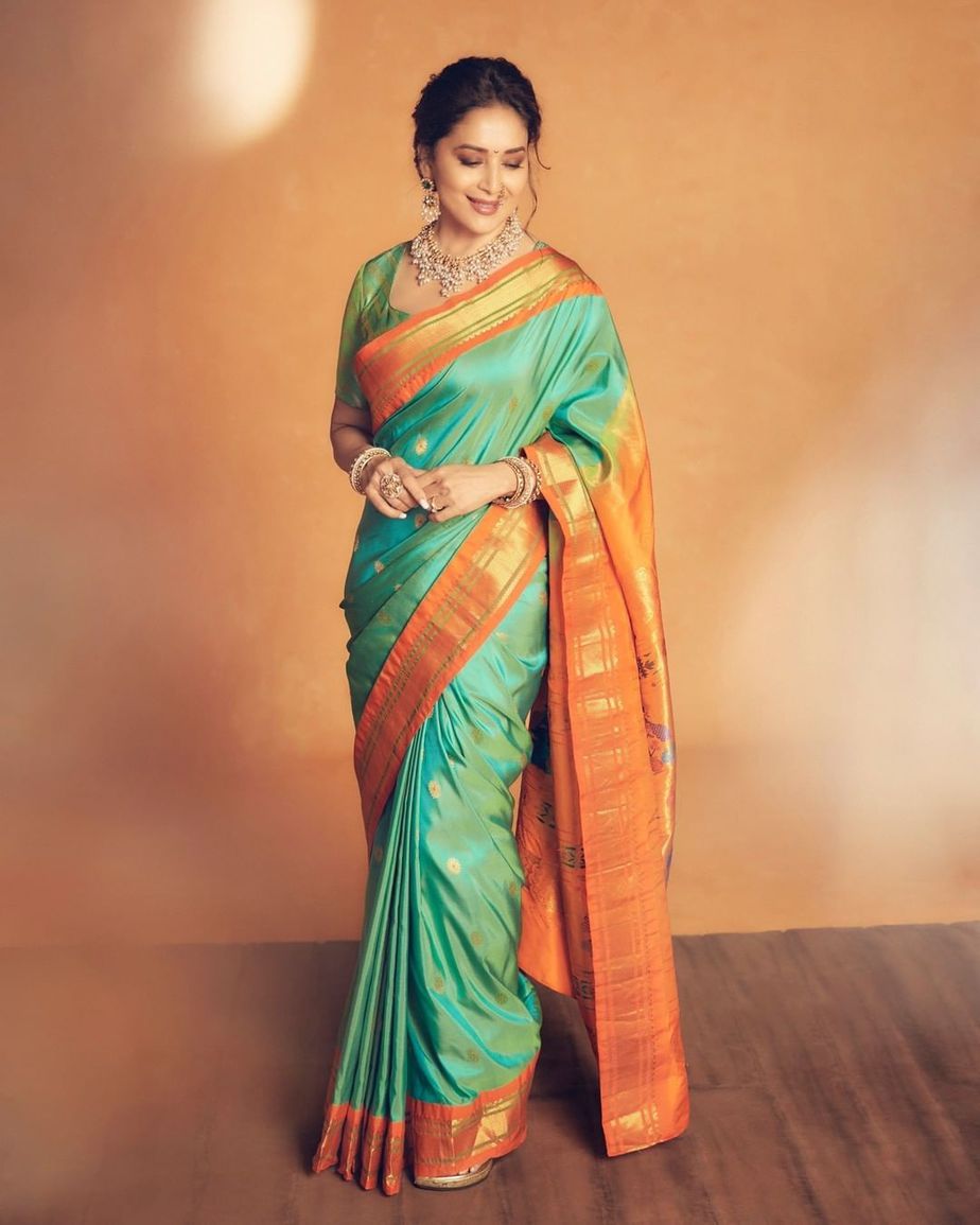 Madhuri Dixit proves why she is an evergreen magnificence in a teal Paithani saree! Madhuri Dixit