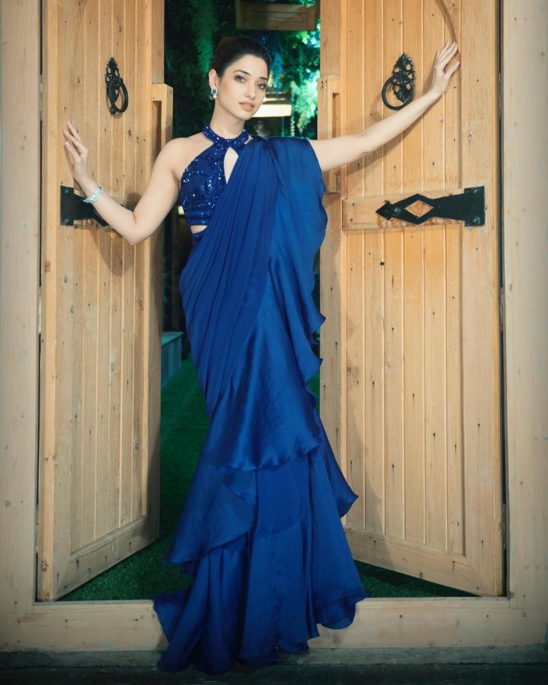 Tamannaah Bhatia ups her fashion sport in a blue ruffle saree! Celebrity Sarees