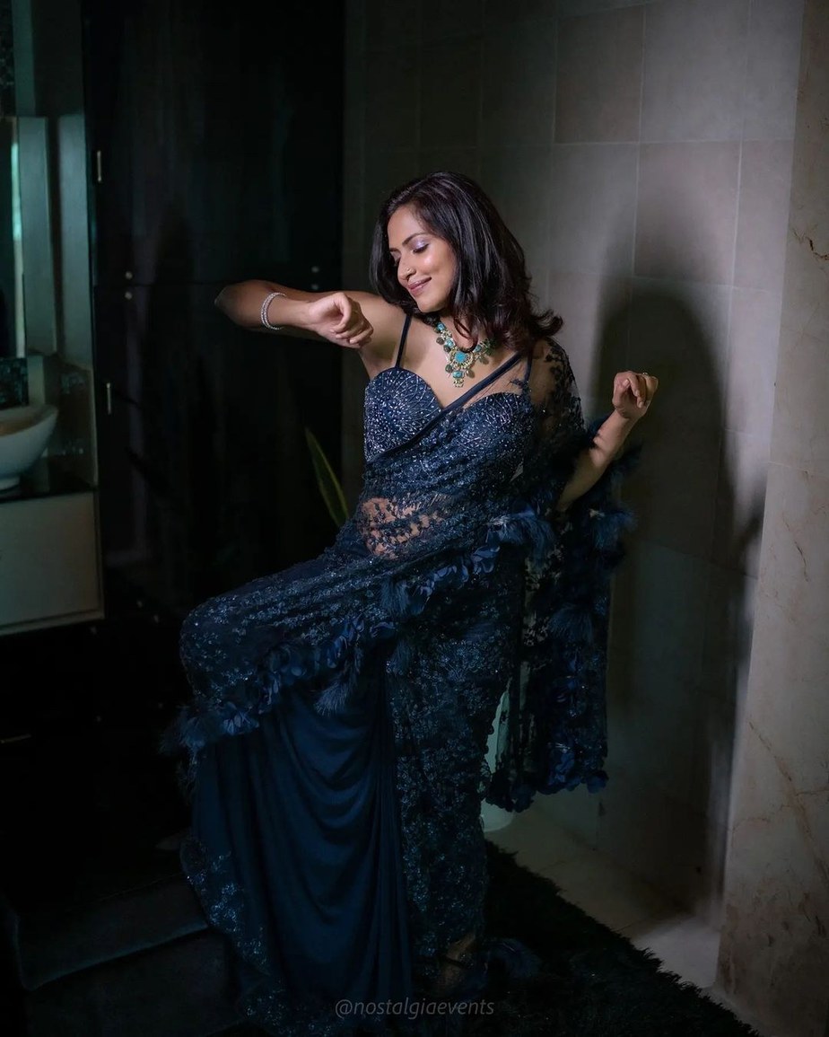 Amala Paul dresses up in a navy blue tulle saree for her brother’s wedding! Celebrity Sarees