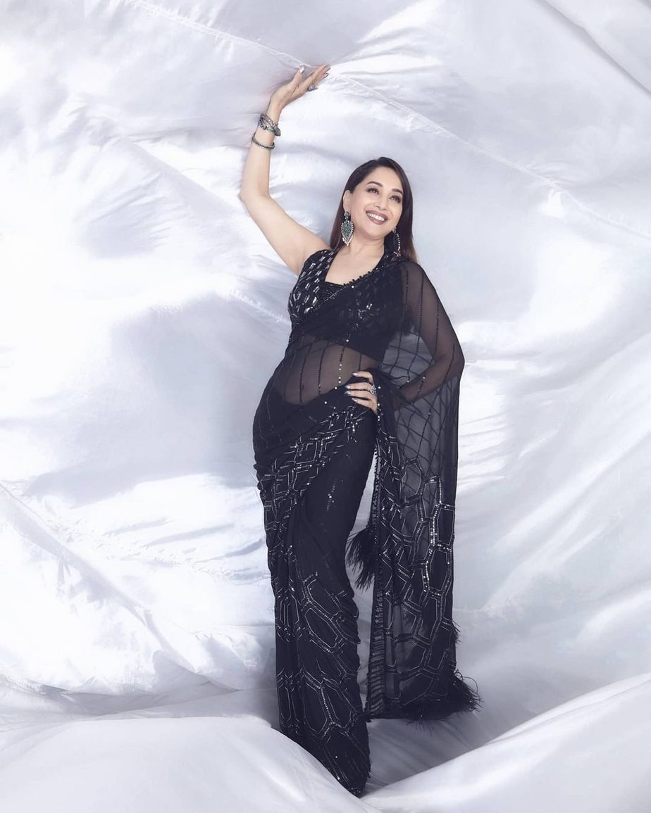 Madhuri Dixit stuns in a black saree for “Dance Deewane!” Manish Malhotra