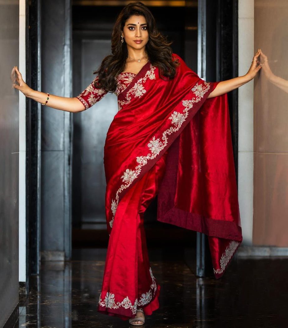 Shriya Saran attends new movie launch function in a red saree! shriya saran in a saree