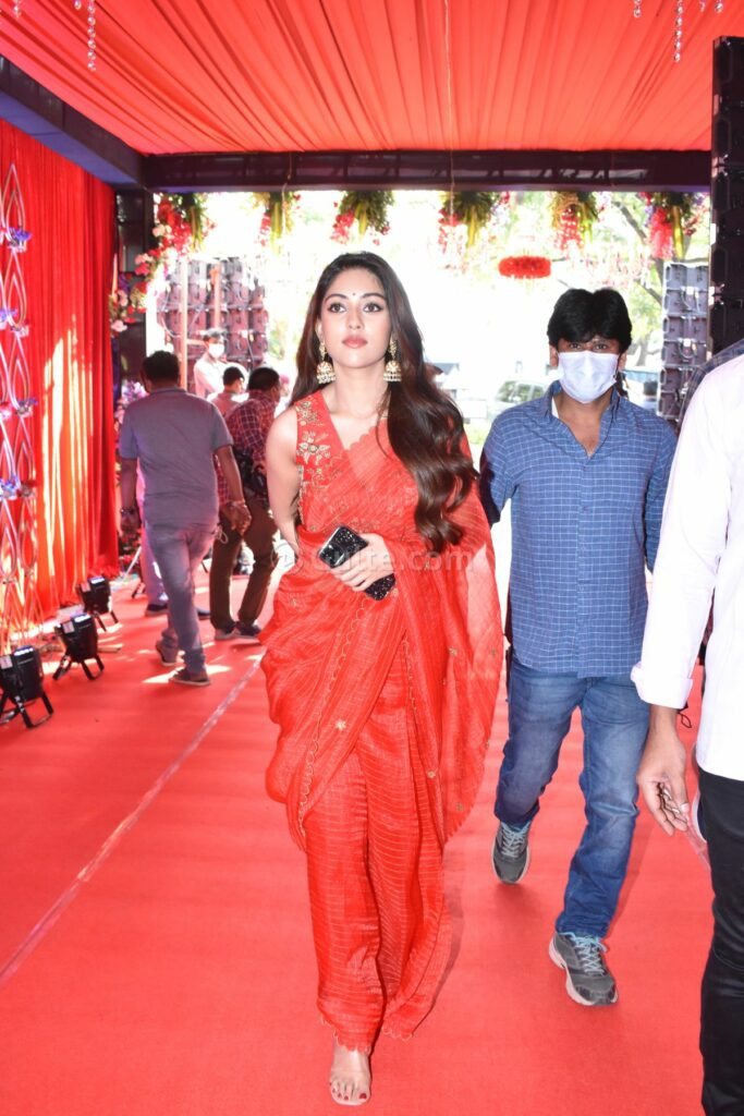 Anu Emmanuel looks ravishing in a red saree at “Raavanasura” movie launch! Celebrity Sarees