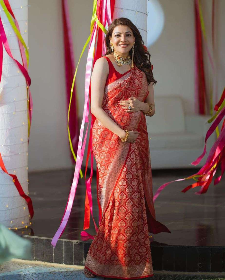 Kajal Aggarwal dresses up in a red traditional saree for her baby shower! Kajal Agarwal