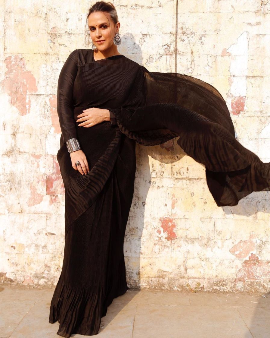Neha Dhupia stuns in a black saree for “Thursday” promotions! Celebrity Sarees