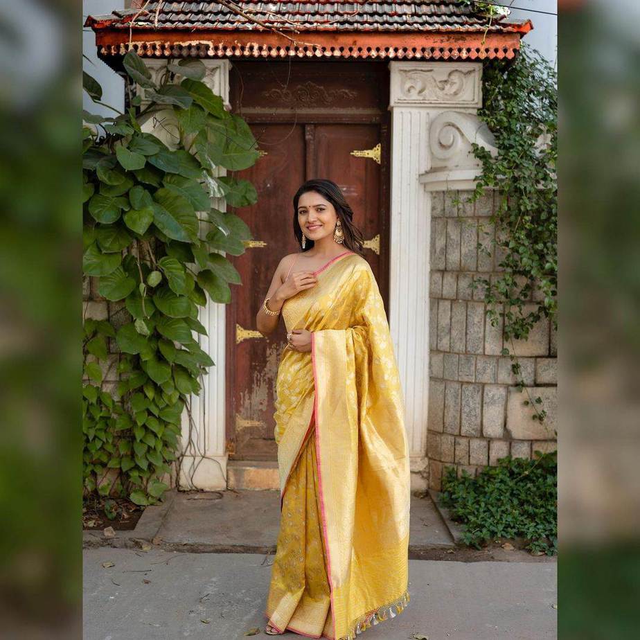 Vani Bhojan in a mustard benarsi saree at “Rekla” movie launch! Celebrity Sarees