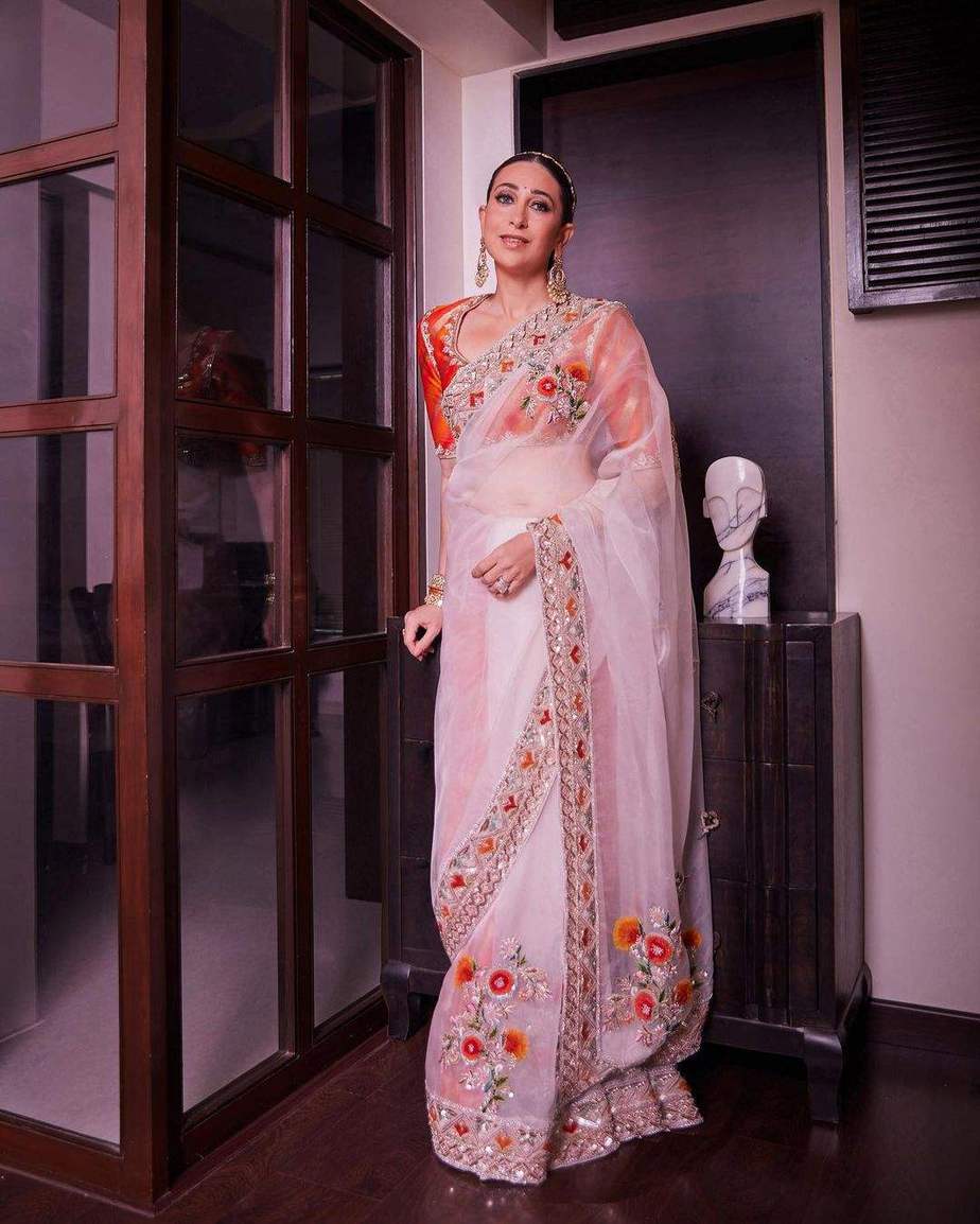 Karisma Kapoor looks splendid in an ivory sheer saree at Ranbir Kapoor’s wedding! Karisma Kapoor looks splendid in an ivory sheer saree at Ranbir Kapoor’s wedding! Manish Malhotra