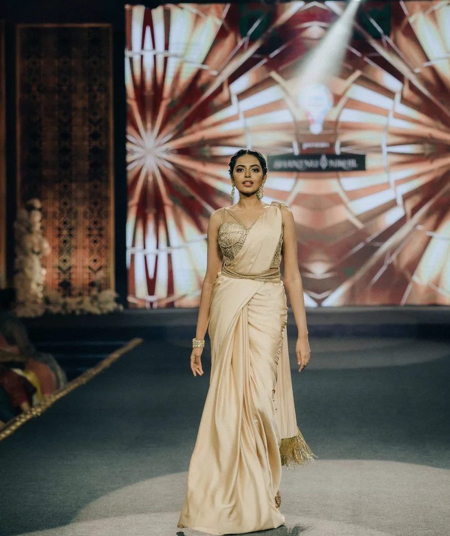 Shivani Rajashekar looks fashionable in a pre-pleated saree at a fashion show! Celebrity Sarees