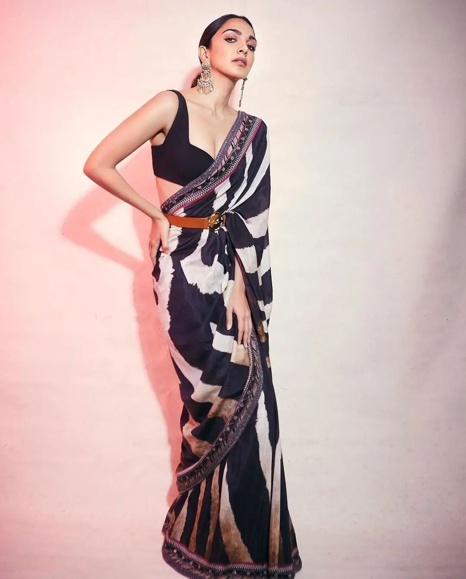Kiara Advani’s on fleek look in a striped saree with a belt for “BB-2” promotions! Kiara Advani