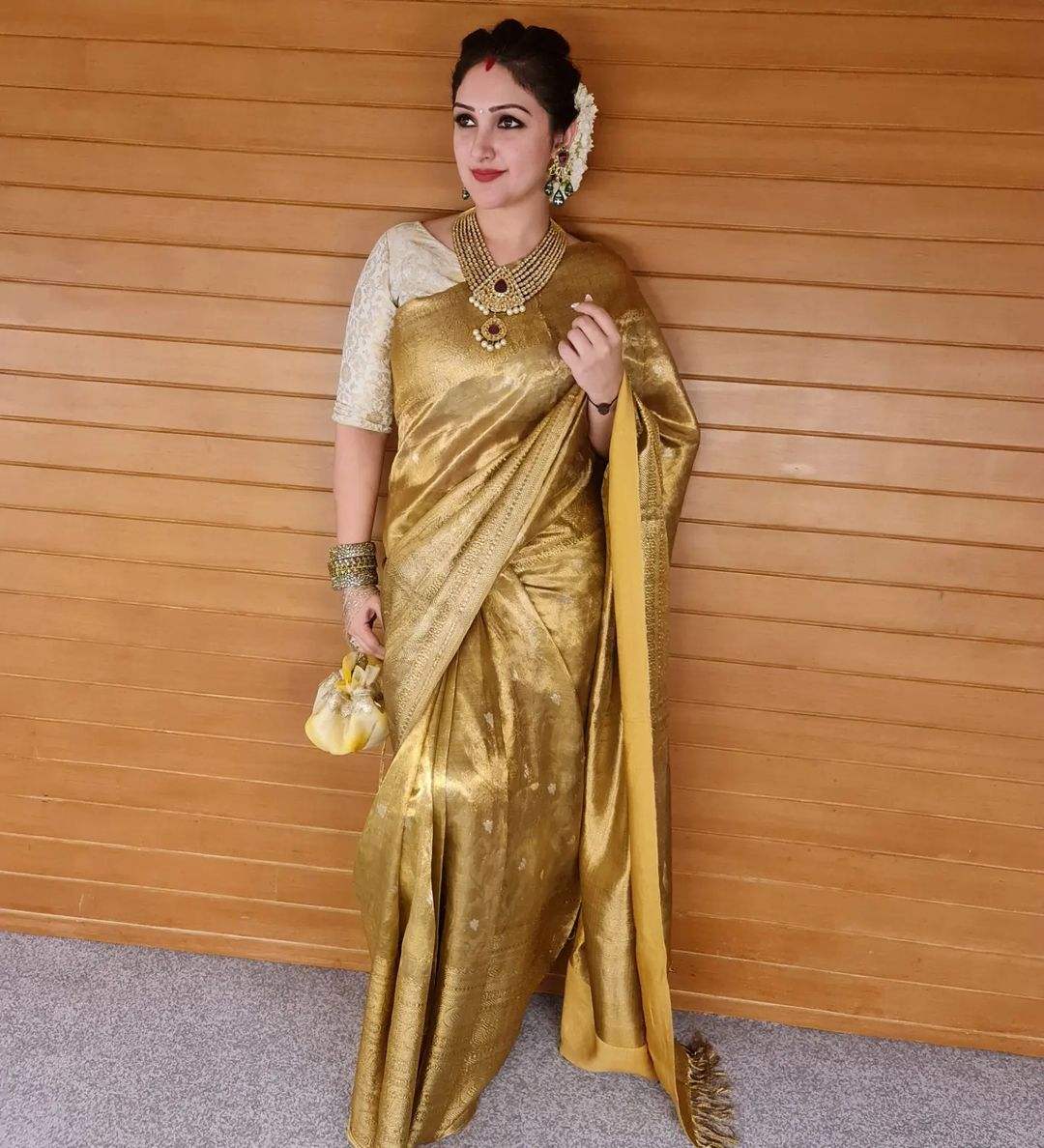 Sridevi Vijaykumar’s regal wedding guest look in a gold silk saree! Sridevi