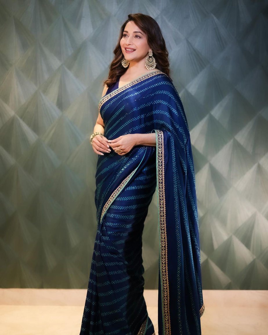 Madhuri Dixit looks effortlessly graceful in a blue saree! Madhuri Dixit