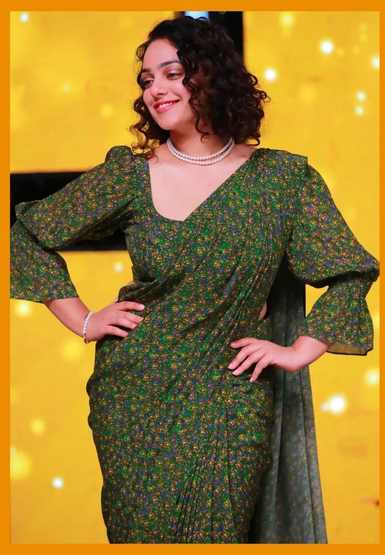 Nithya Menen looks strikingly beautiful in a green floral saree for “Indian Idol!” Celebrity Sarees