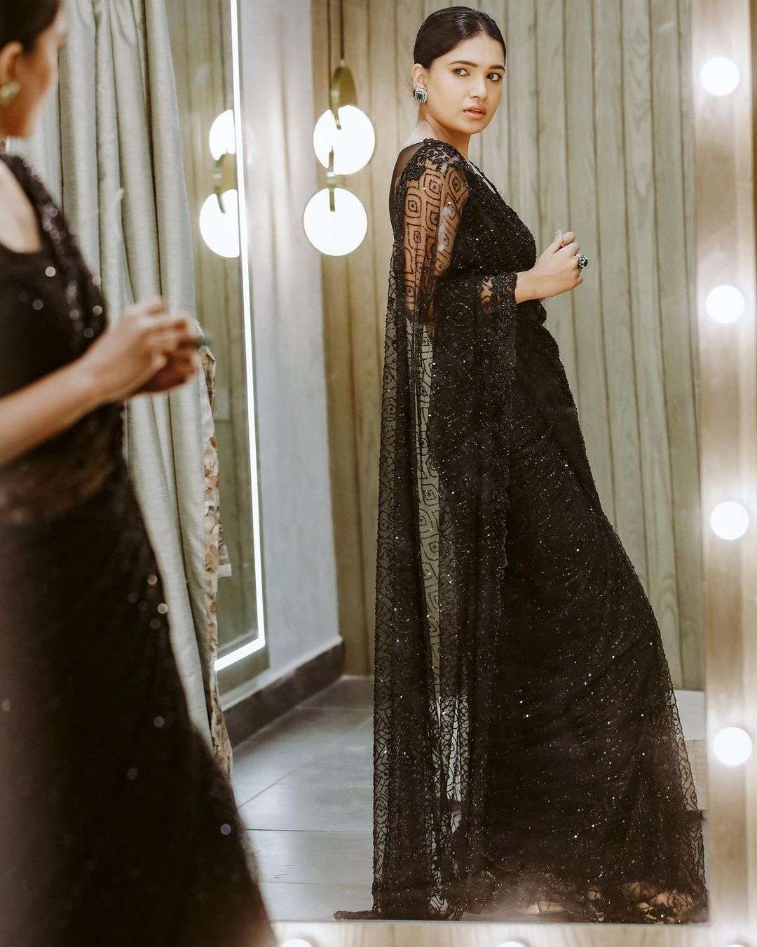 Vani Bhojan’s sparkly look in an embroidered tulle saree! Vani Bhojan’s sparkly look in an embroidered tulle saree! Vani Bhojan in a saree