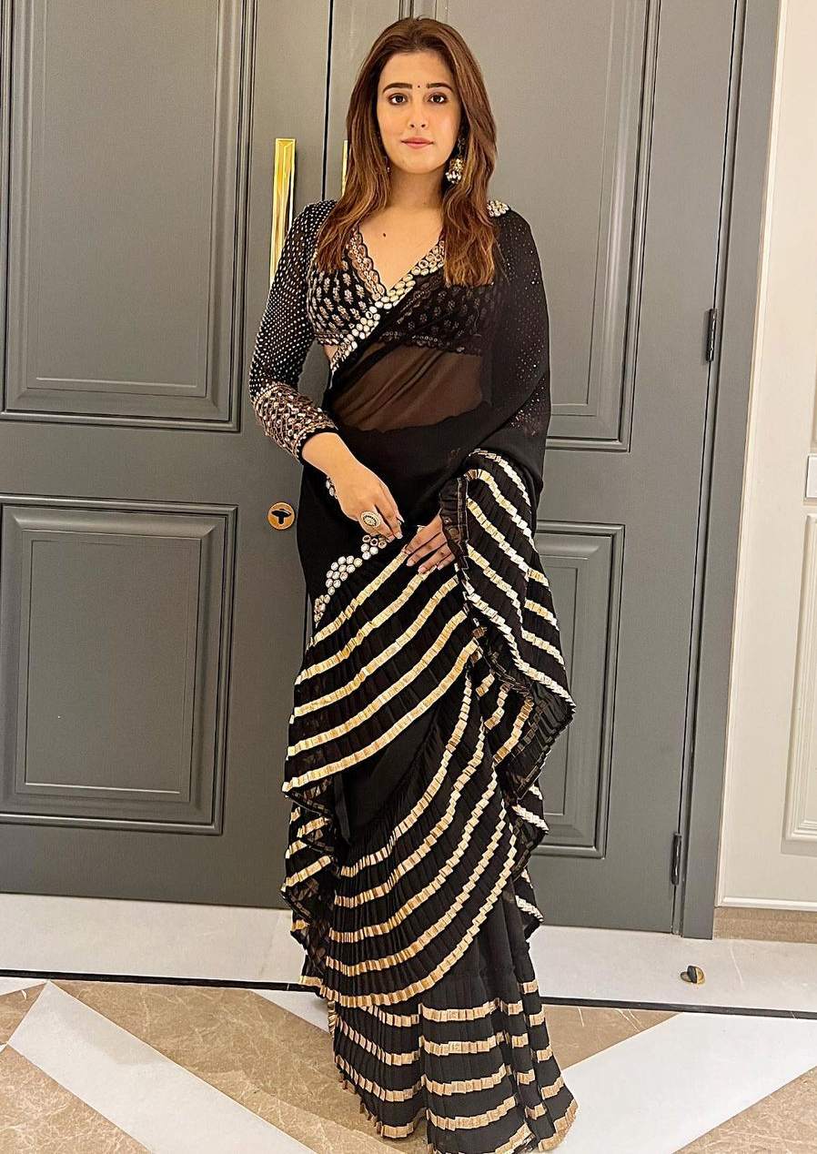 Nupur Sanon’s classy look in a black ruffle saree and embroidered blouse! How to style a ruffle saree