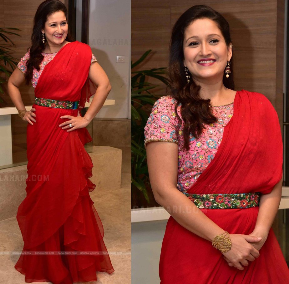 Laila pairs up her red ruffle saree with a belt and pink blouse for “Sardar” promotions! Celebrity Sarees