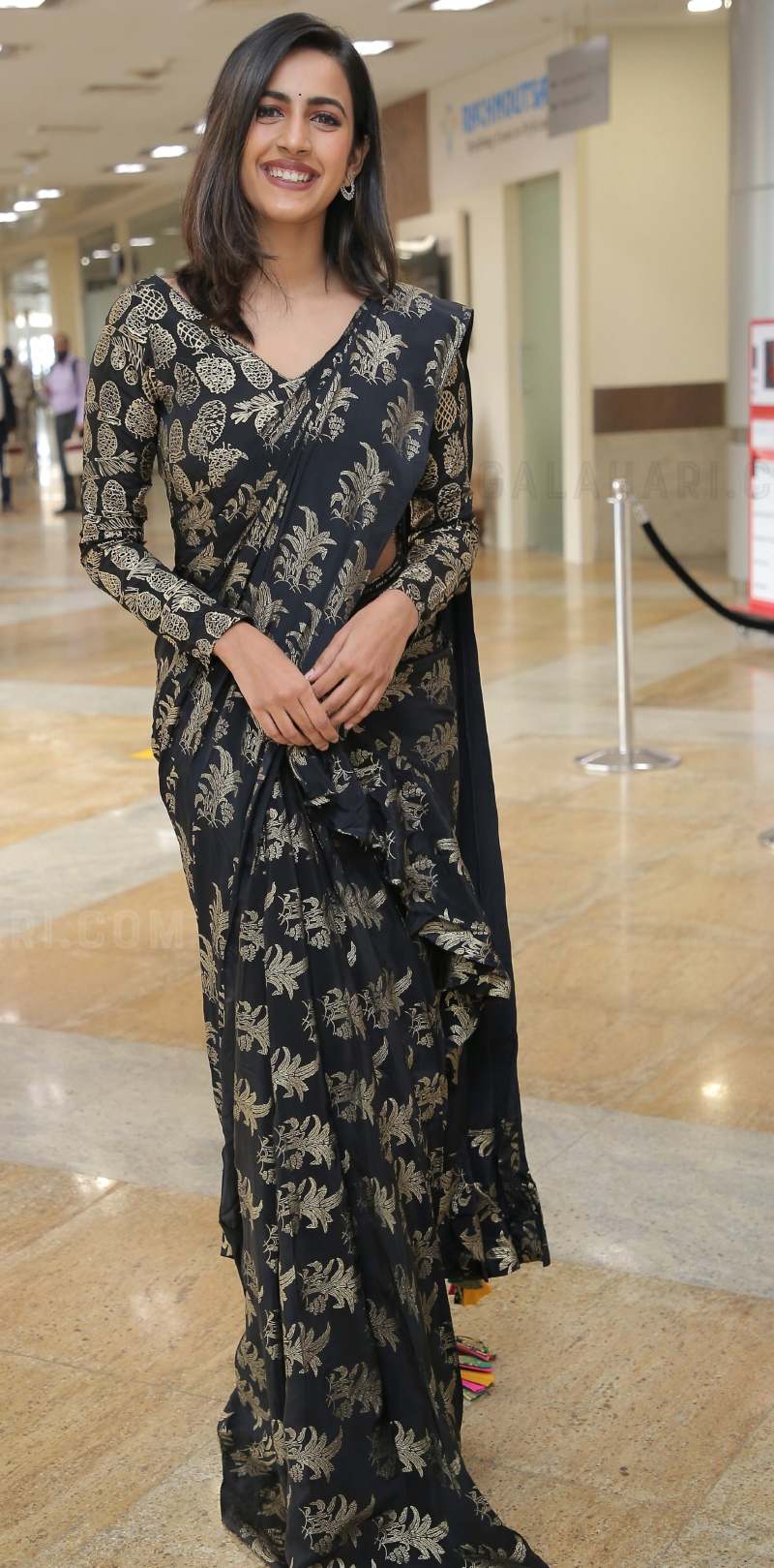 Niharika Konidela looks chic in a pre draped foil printed saree at an event! How to style a pre draped saree